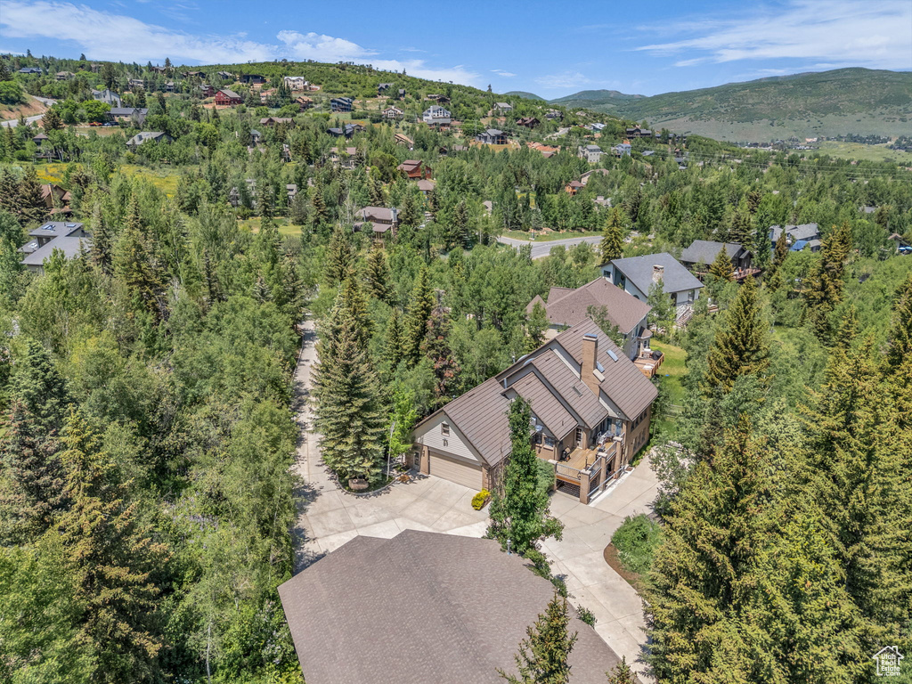 Aerial view of residential area with a mountain backdrop