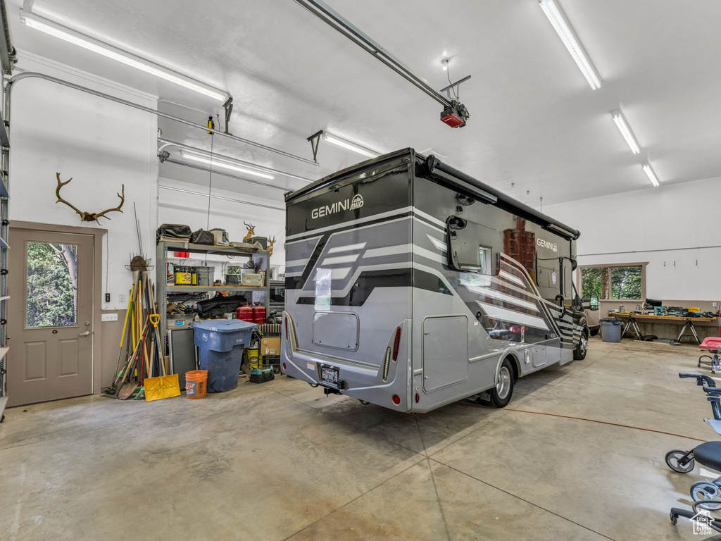 Garage featuring a garage door opener