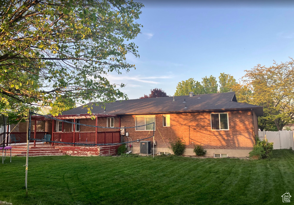 Back of property with brick siding