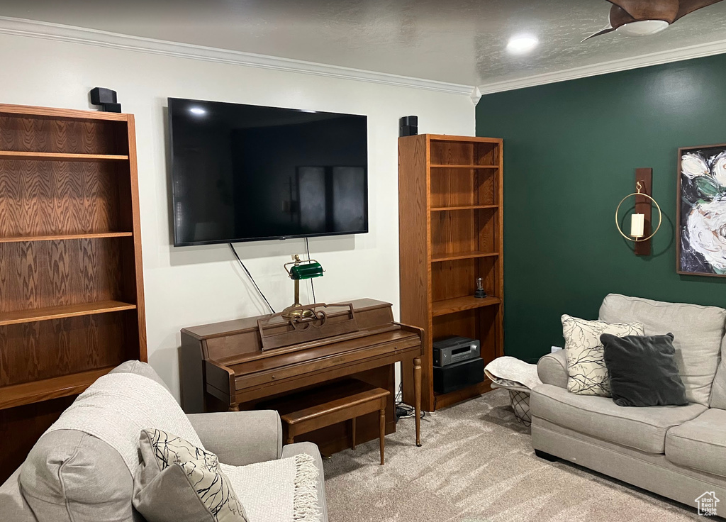 Living room featuring ornamental molding
