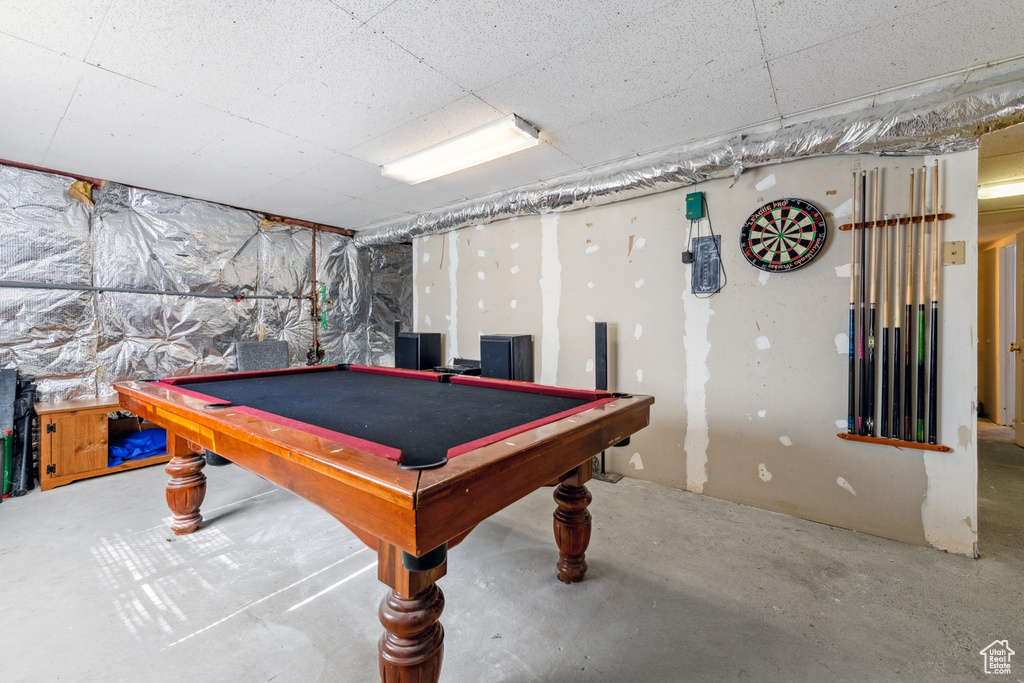 Recreation room featuring pool table and concrete floors