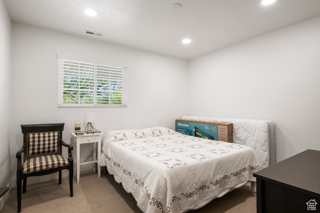 Bedroom featuring carpet and recessed lighting