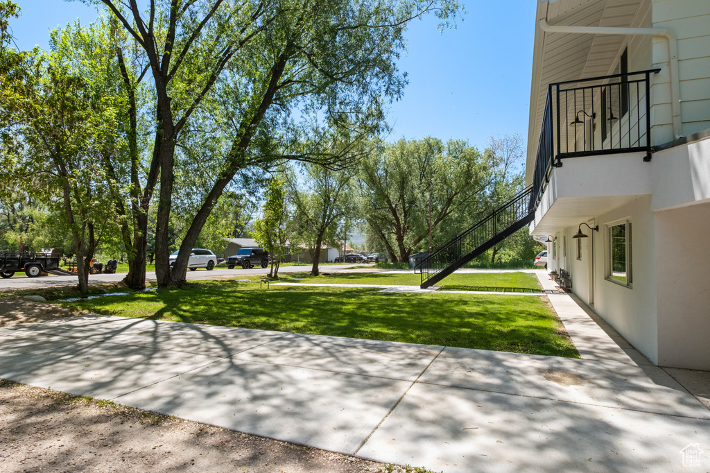 View of green lawn with stairs