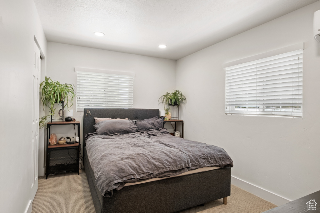 Bedroom with carpet and recessed lighting