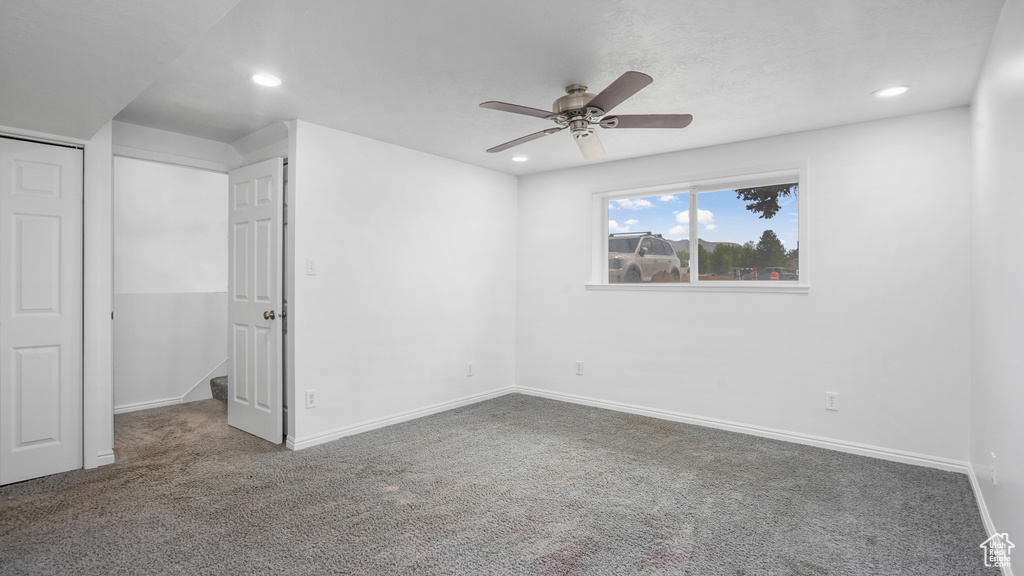 Unfurnished bedroom featuring carpet, recessed lighting, a closet, and ceiling fan