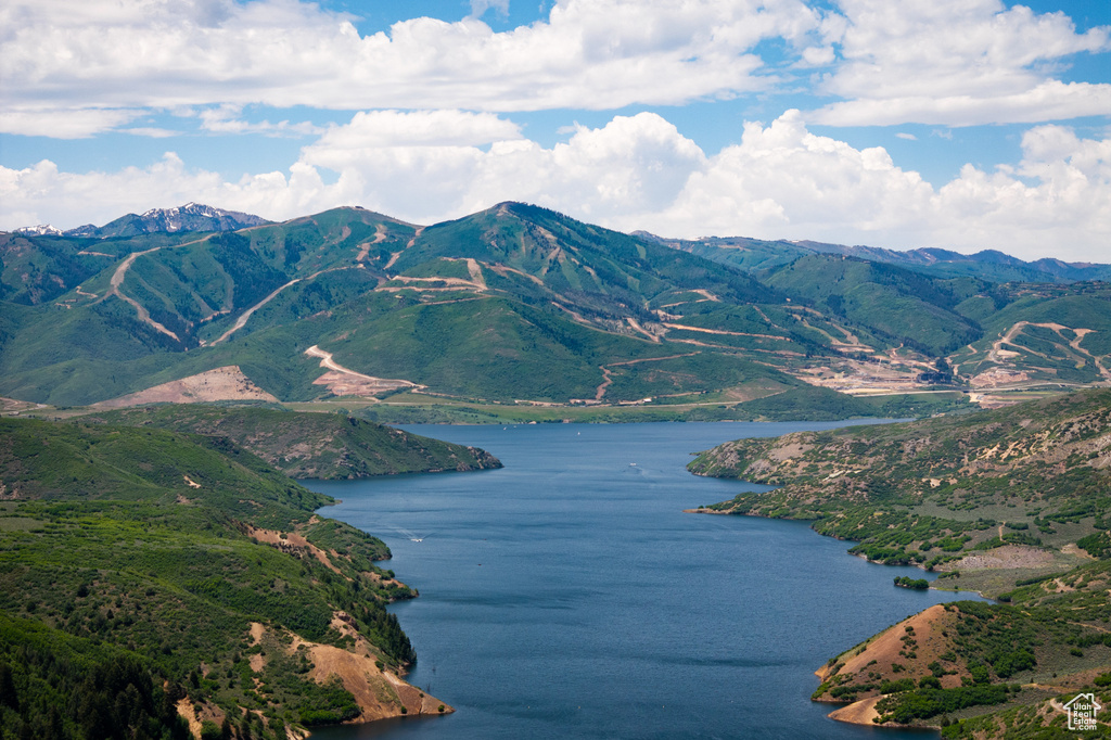 View of mountain background with a nearby body of water