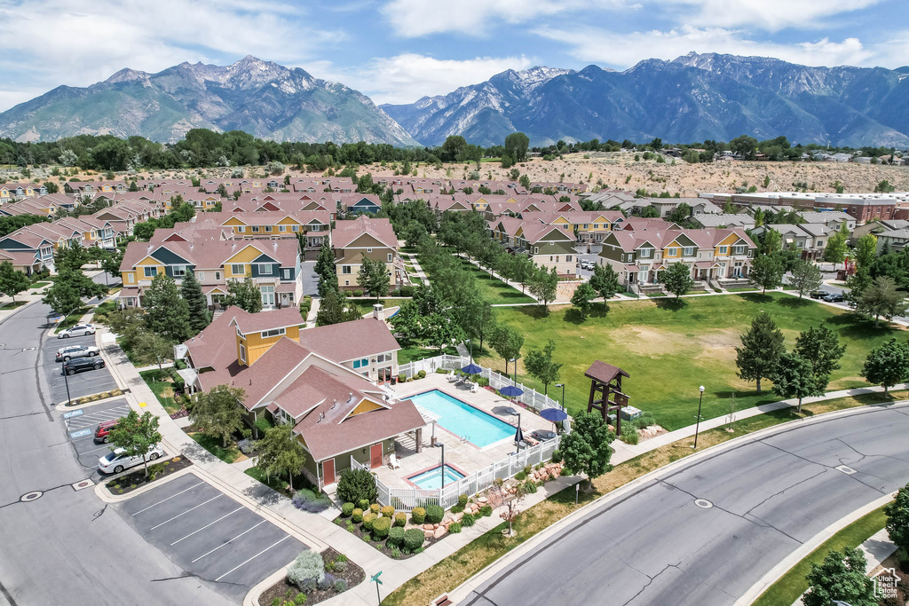 Aerial view of residential area with a mountainous background