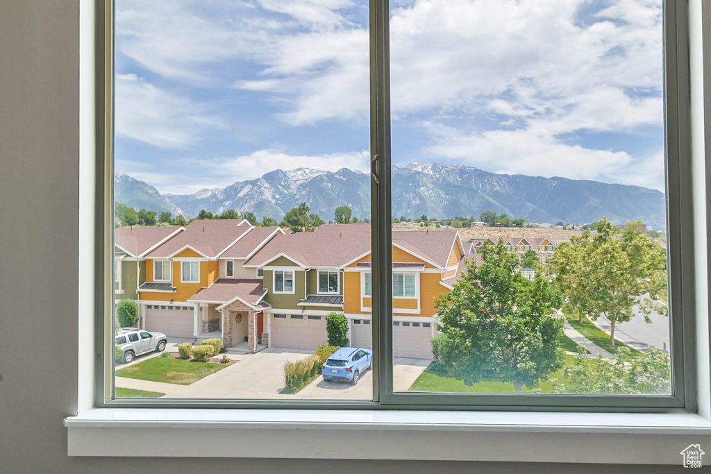 View of mountain backdrop featuring nearby suburban area