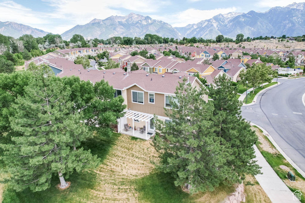 View of property location with mountains and nearby suburban area