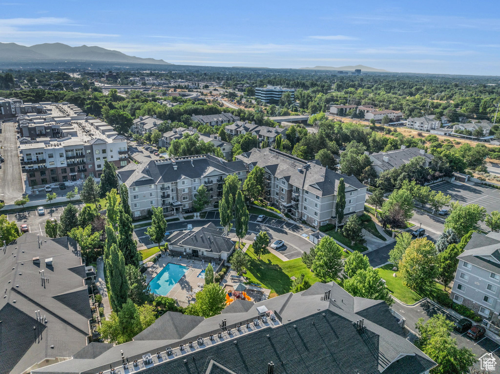 Aerial view of a mountainous background and a pool