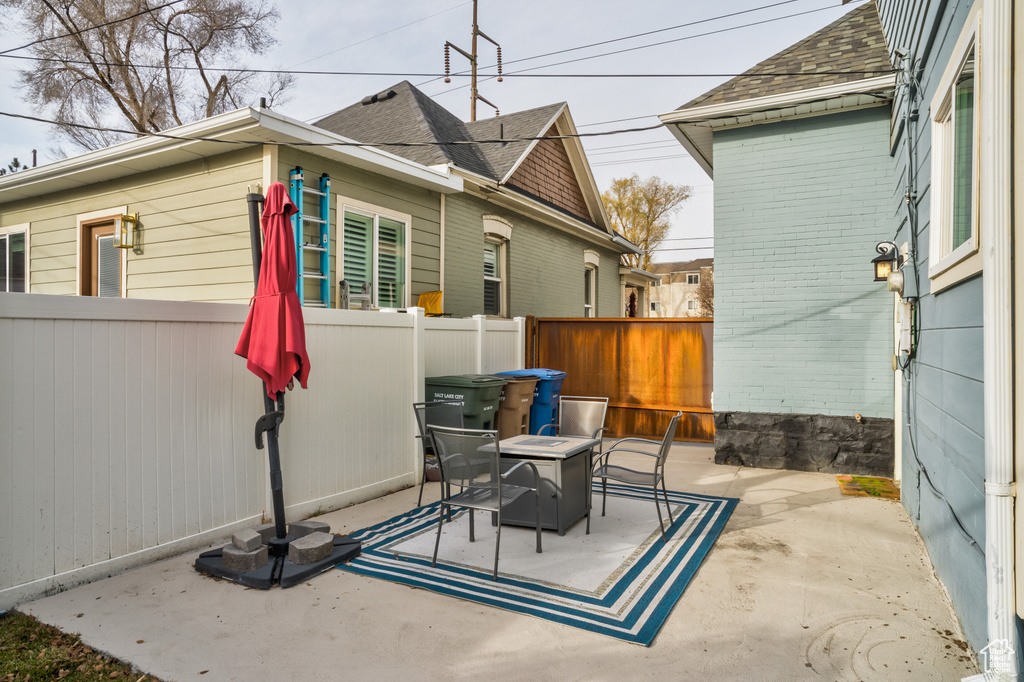 View of patio / terrace with a fire pit