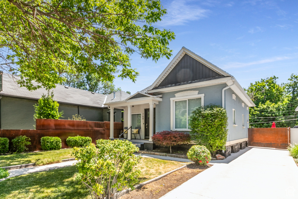 View of front of house with board and batten siding
