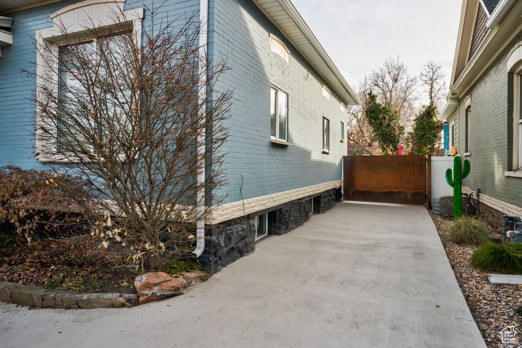 View of home's exterior featuring brick siding
