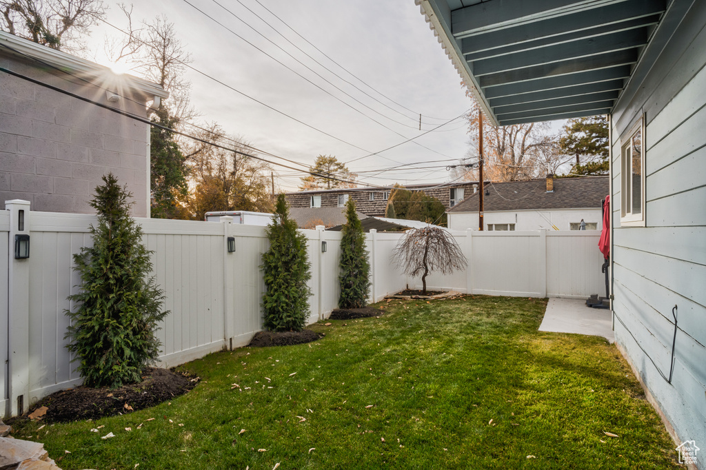 View of fenced backyard