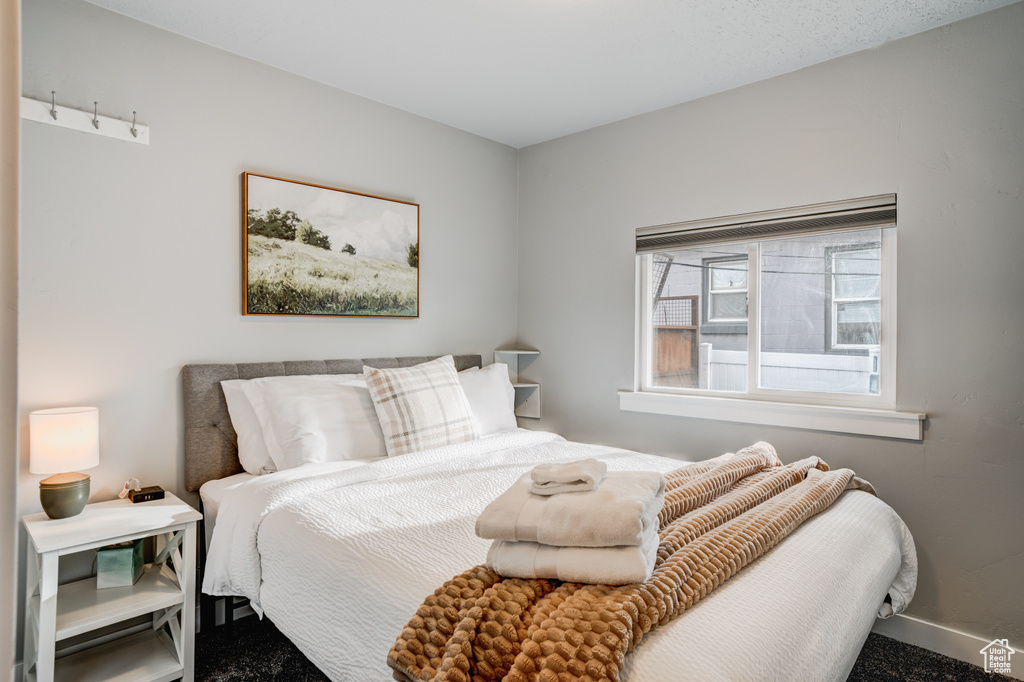 Bedroom featuring baseboards