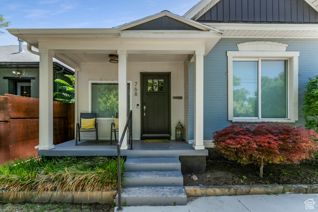 Property entrance with a porch