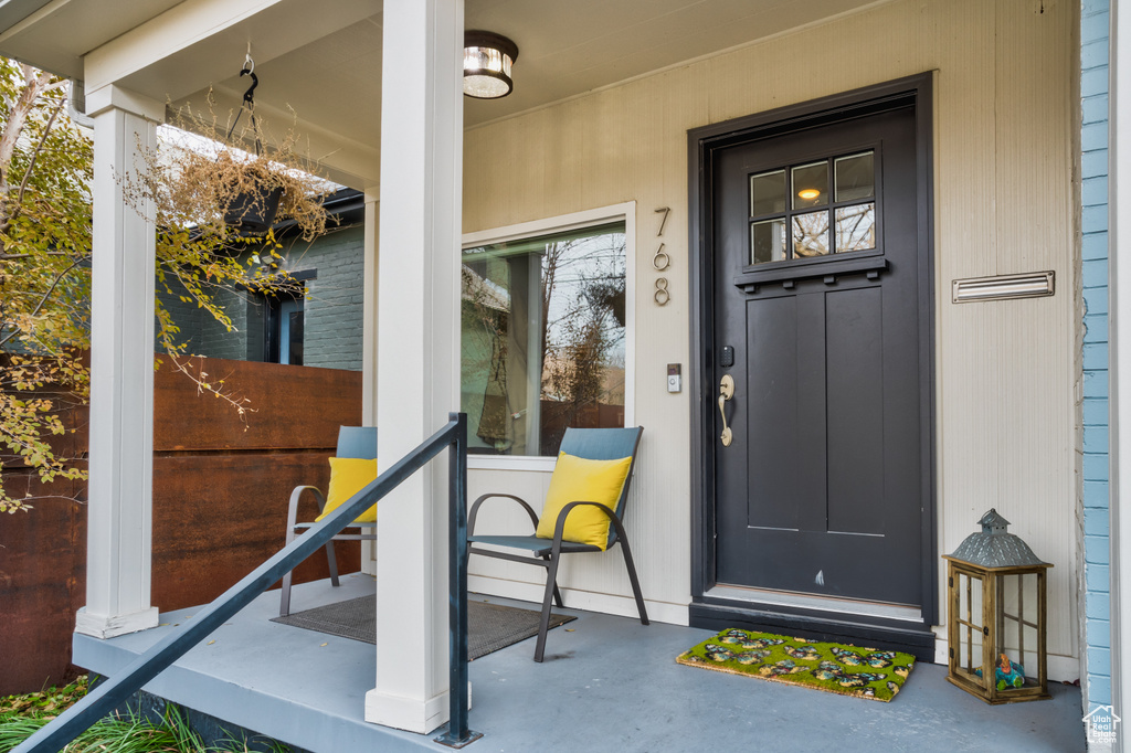 Entrance to property with a porch