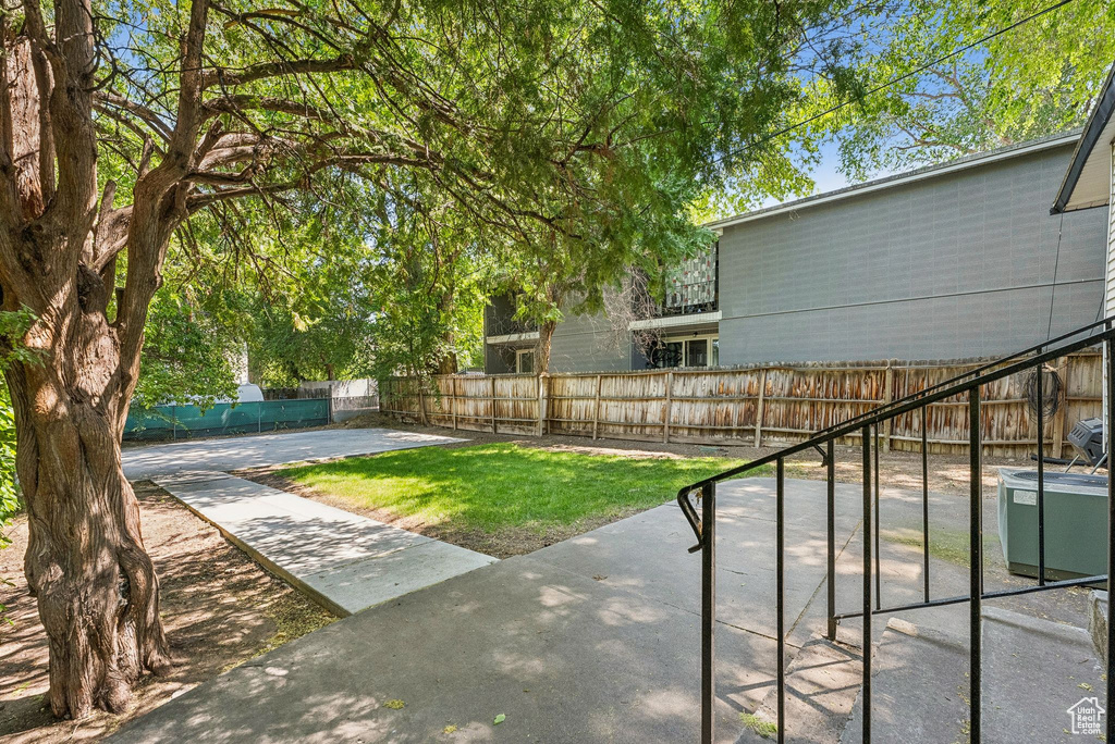 Fenced yard featuring a patio area