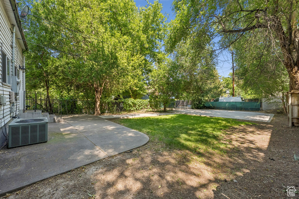 Fenced backyard featuring a patio area