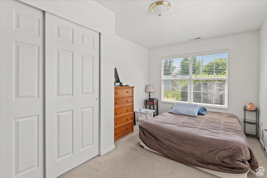 Bedroom featuring carpet
