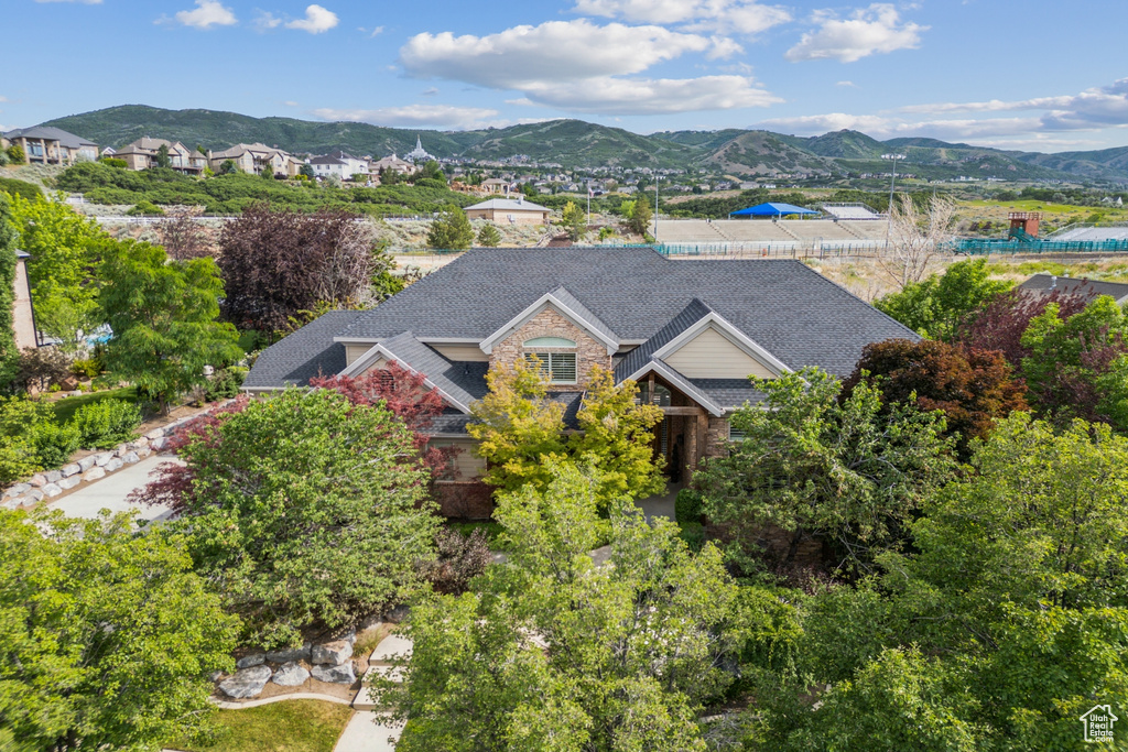 View of subject property featuring a mountain backdrop