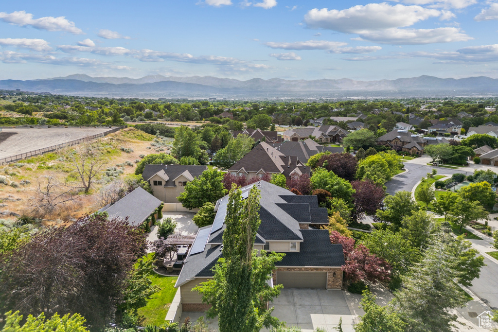 Aerial view of residential area with mountains