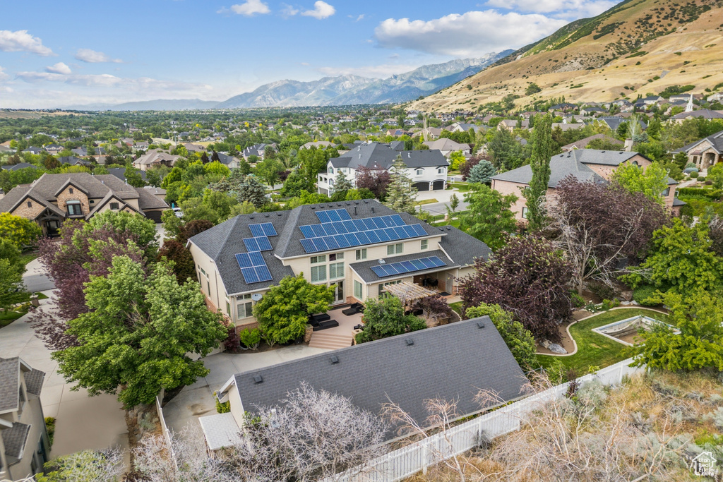 Aerial view of residential area with a mountain backdrop