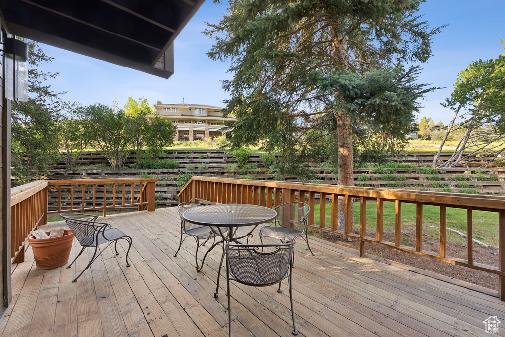 Wooden deck with outdoor dining area
