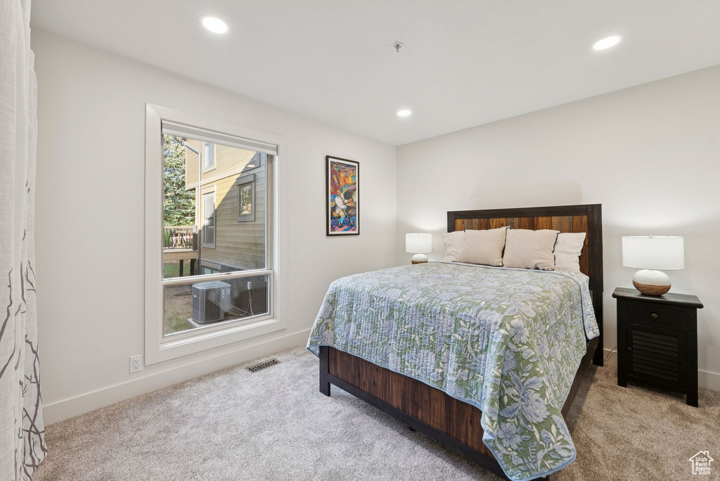 Bedroom with carpet flooring and recessed lighting