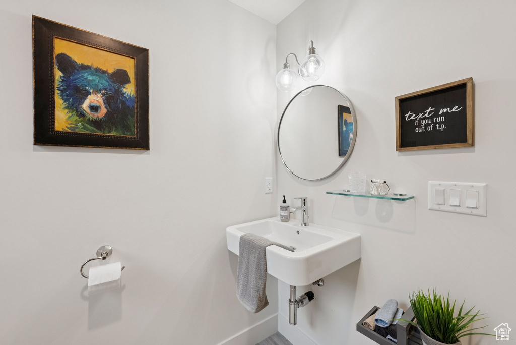 Bathroom featuring baseboards