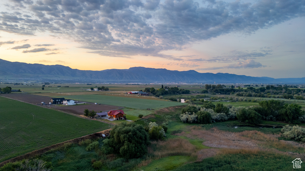 View of mountain backdrop featuring rural landscape
