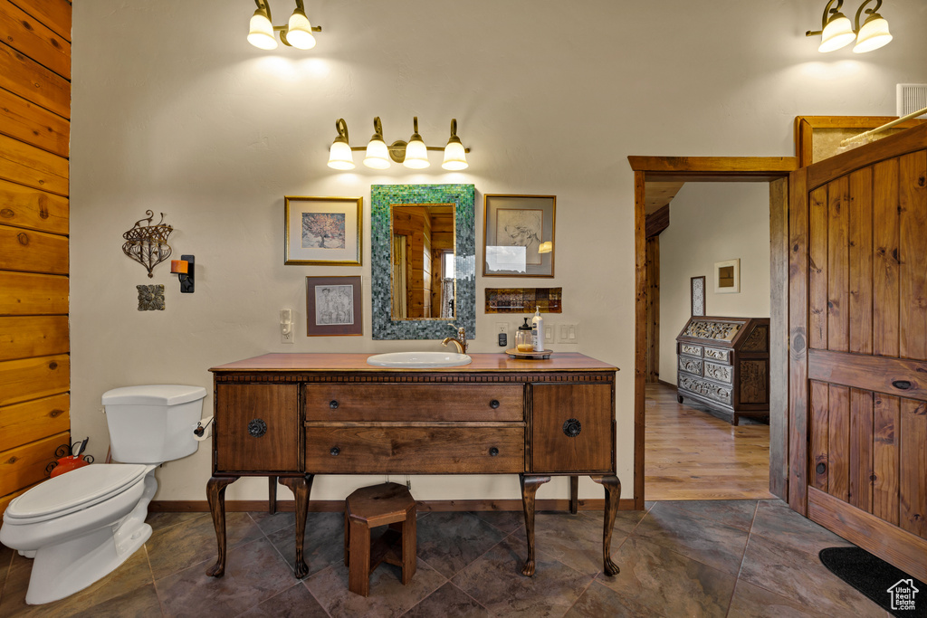 Bathroom with toilet and vanity