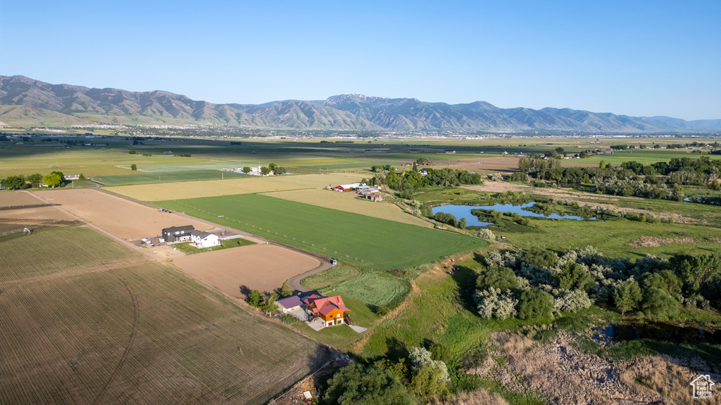 Aerial overview of property\'s location featuring rural landscape and a water and mountain view