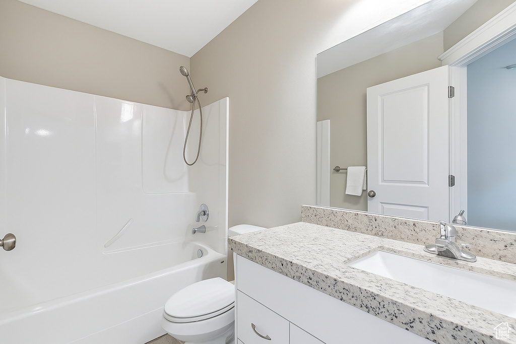Full bathroom with vanity and bathing tub / shower combination