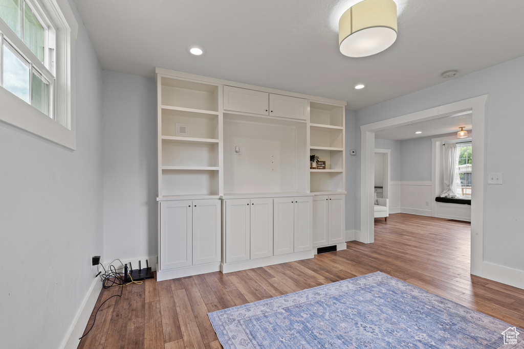 Unfurnished bedroom featuring wood finished floors and recessed lighting