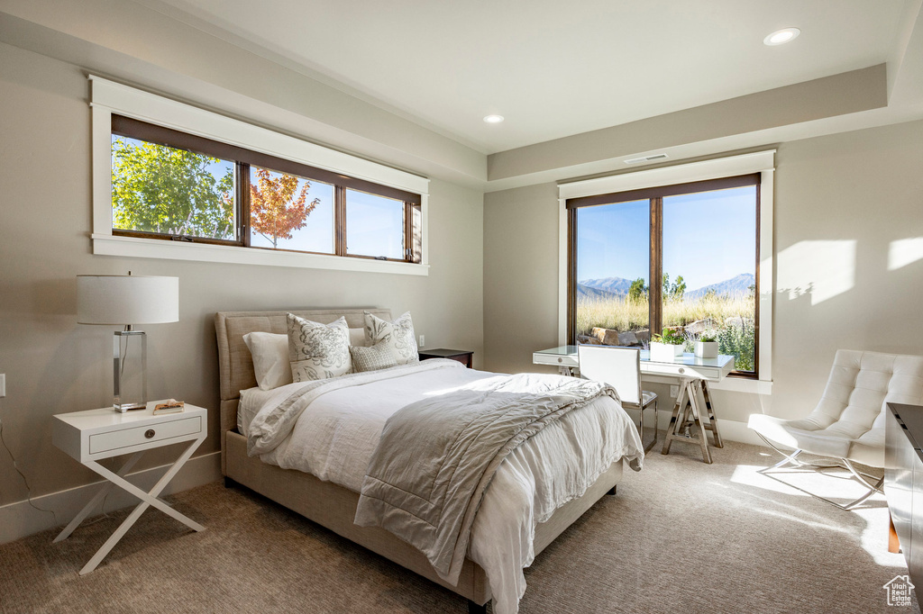 Bedroom with carpet floors, a mountain view, and recessed lighting