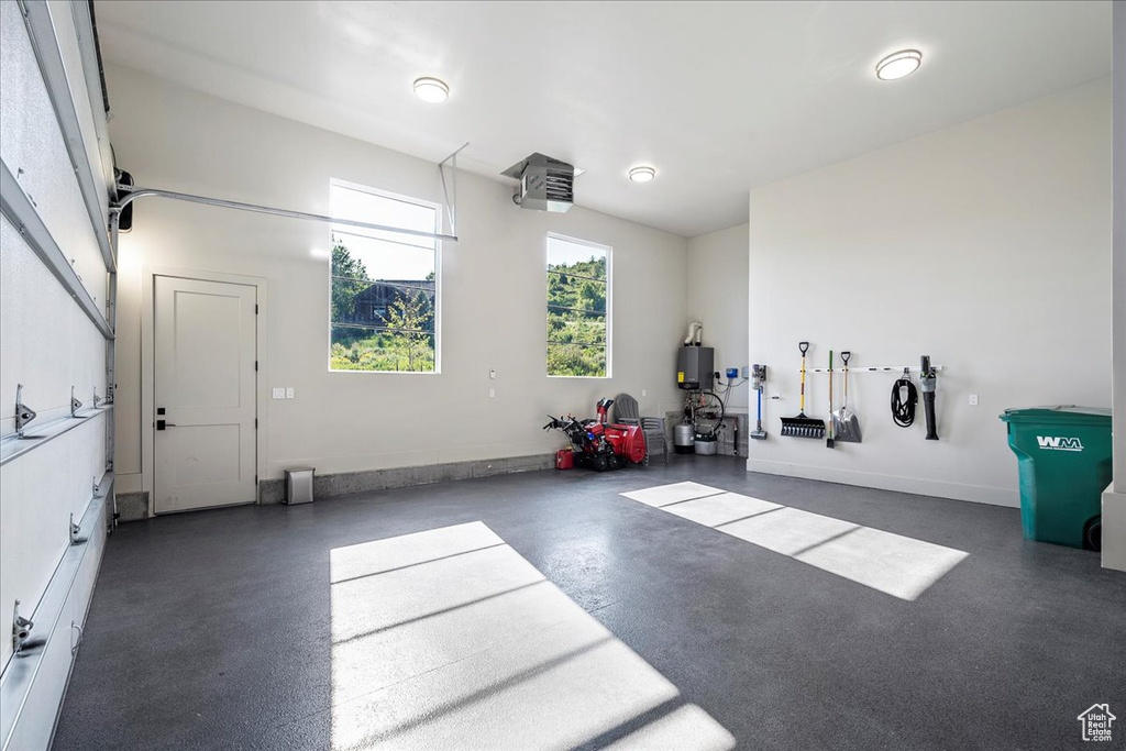 Garage featuring water heater
