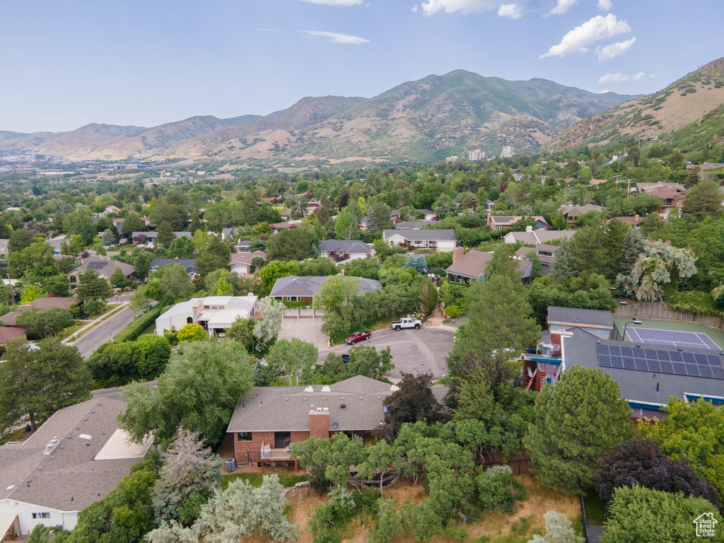 Aerial view of residential area with a mountainous background