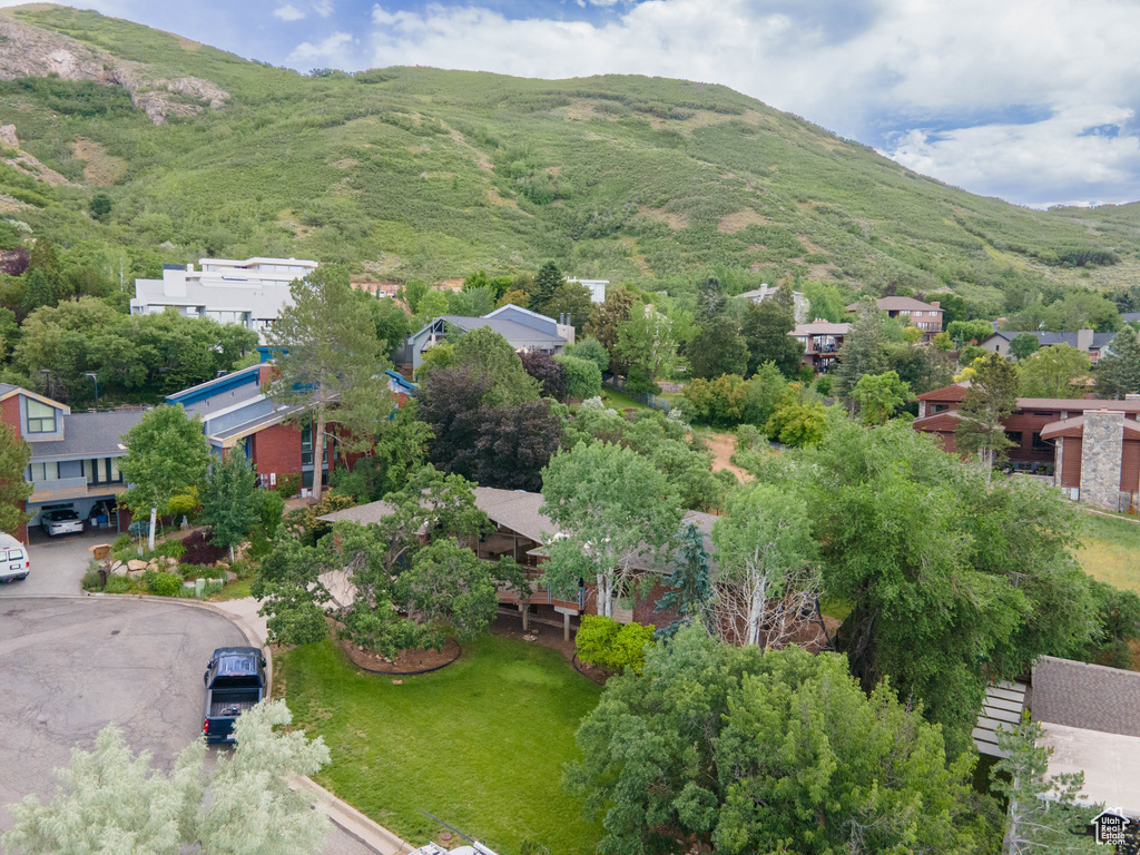 Aerial view of residential area featuring a mountain backdrop