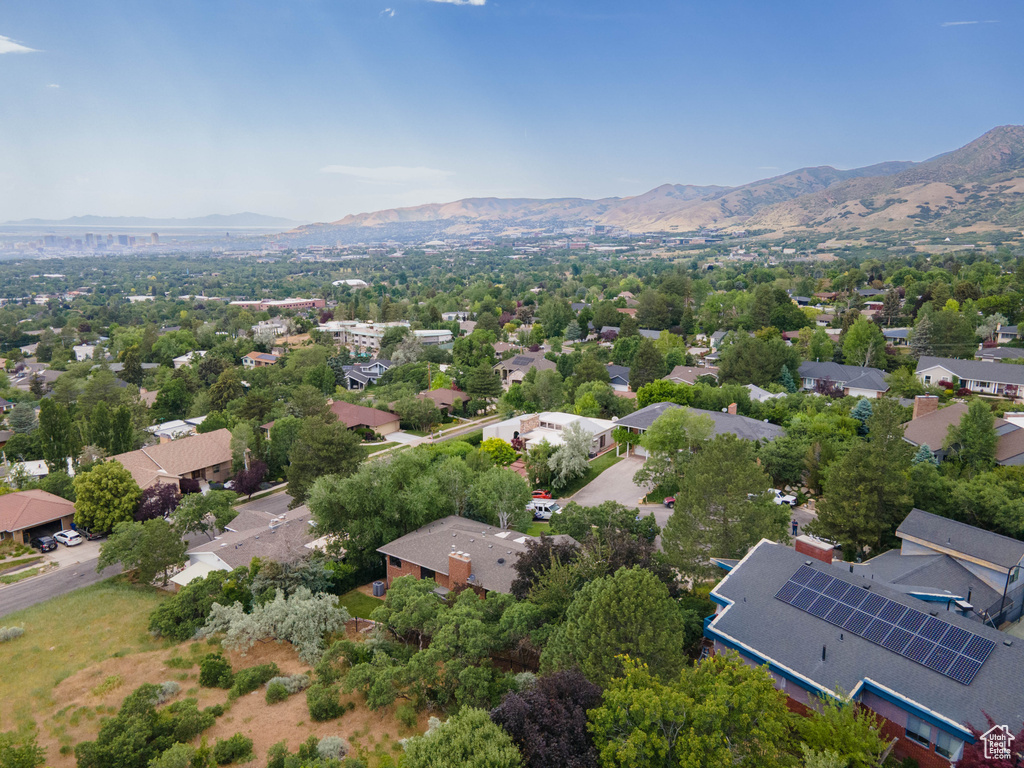 Aerial view of residential area with mountains