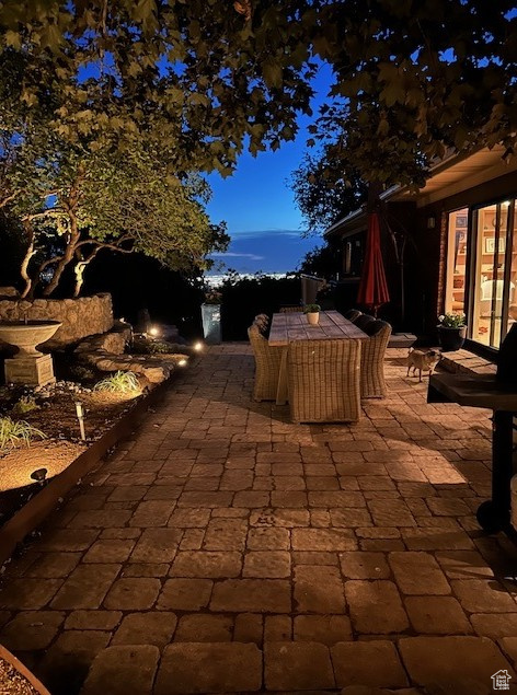 View of patio with outdoor dining area
