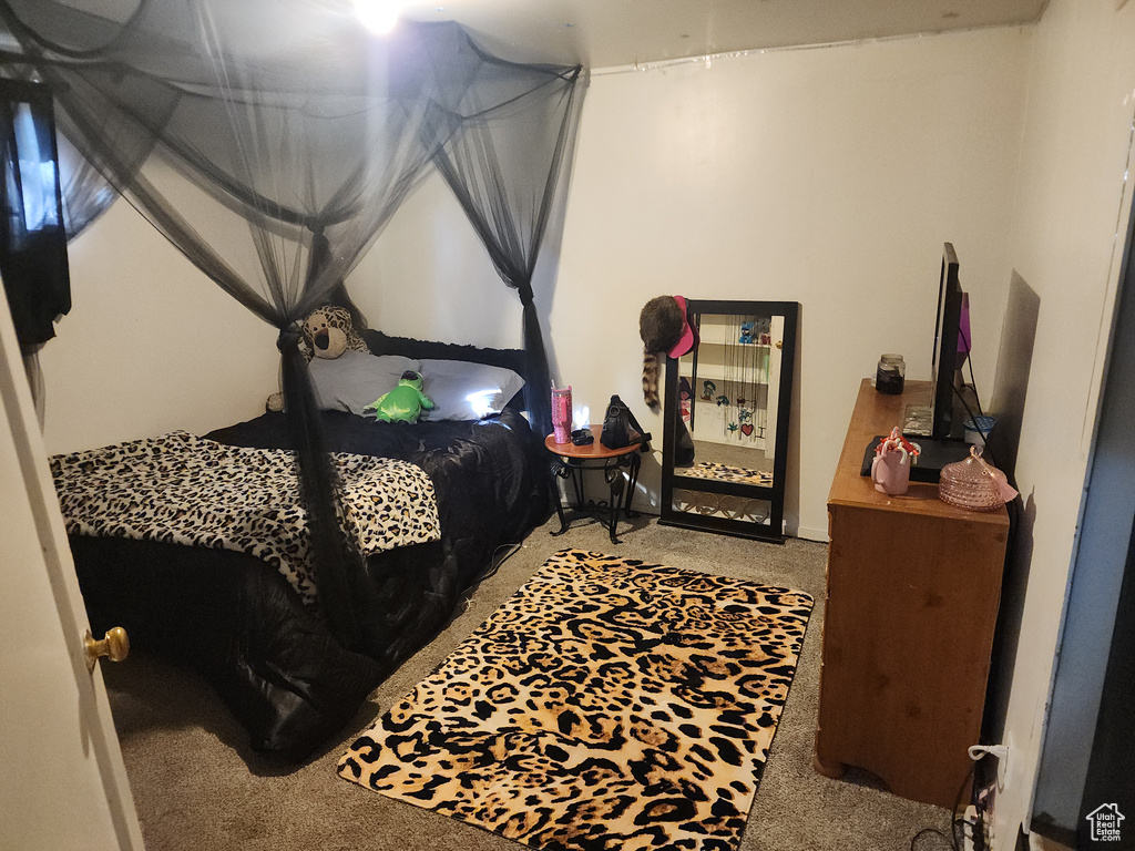 Bedroom featuring carpet flooring