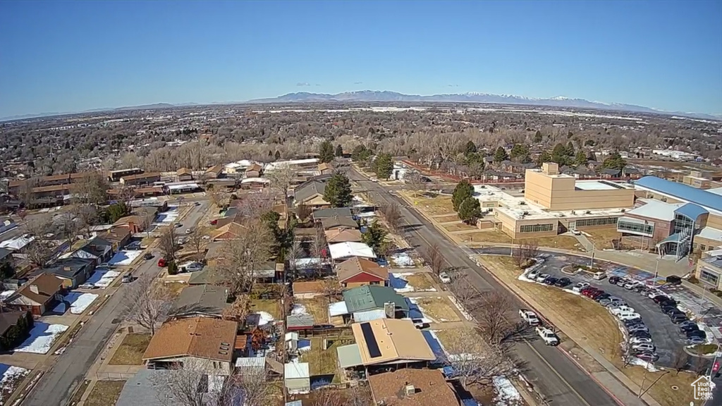 Aerial view of property\\\\\\\\\\\\\\\'s location featuring mountains and nearby suburban area