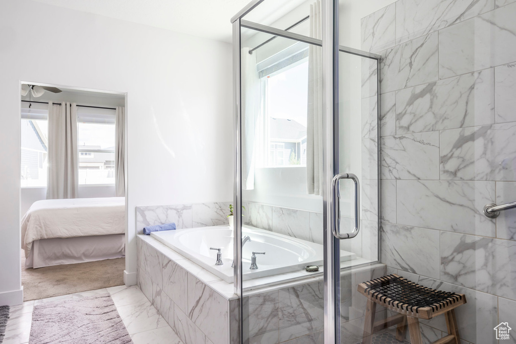 Ensuite bathroom with a garden tub and a stall shower