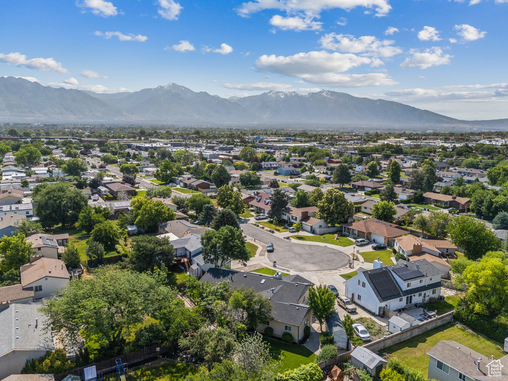 Aerial view of residential area with a mountain backdrop