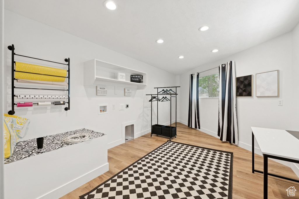 Mudroom with light wood-style floors and recessed lighting