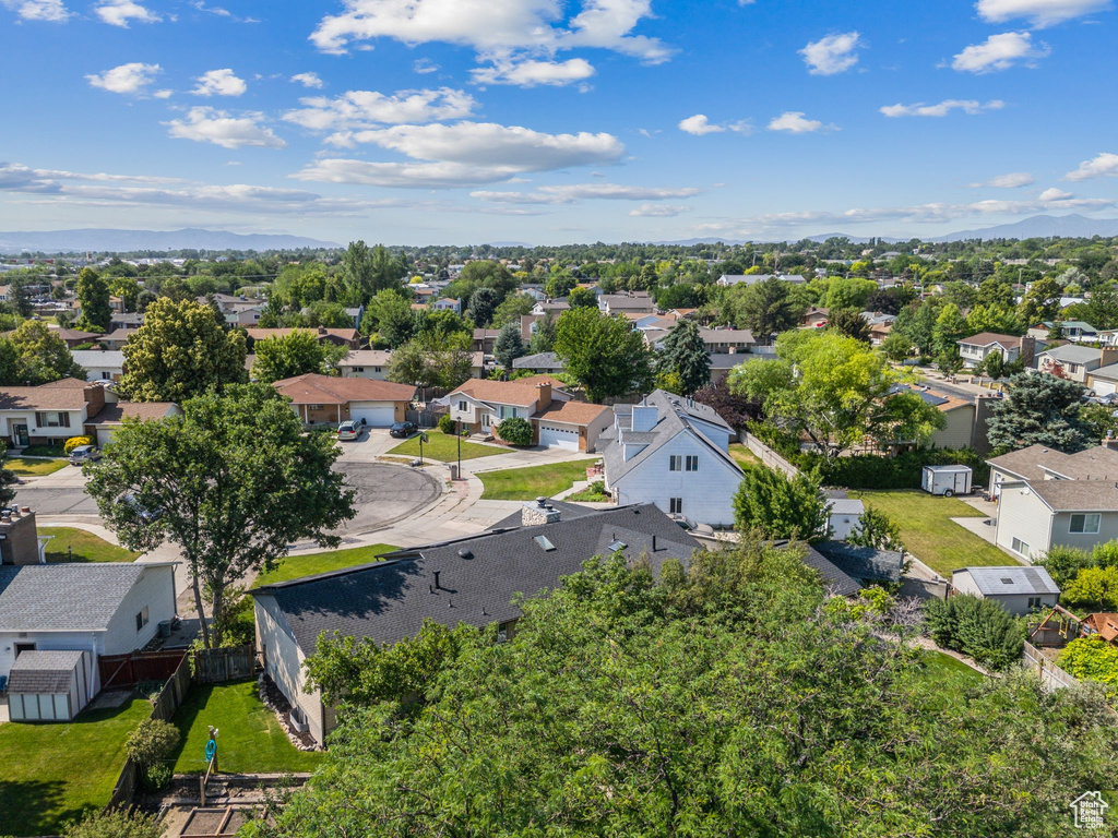 Aerial view of residential area with mountains