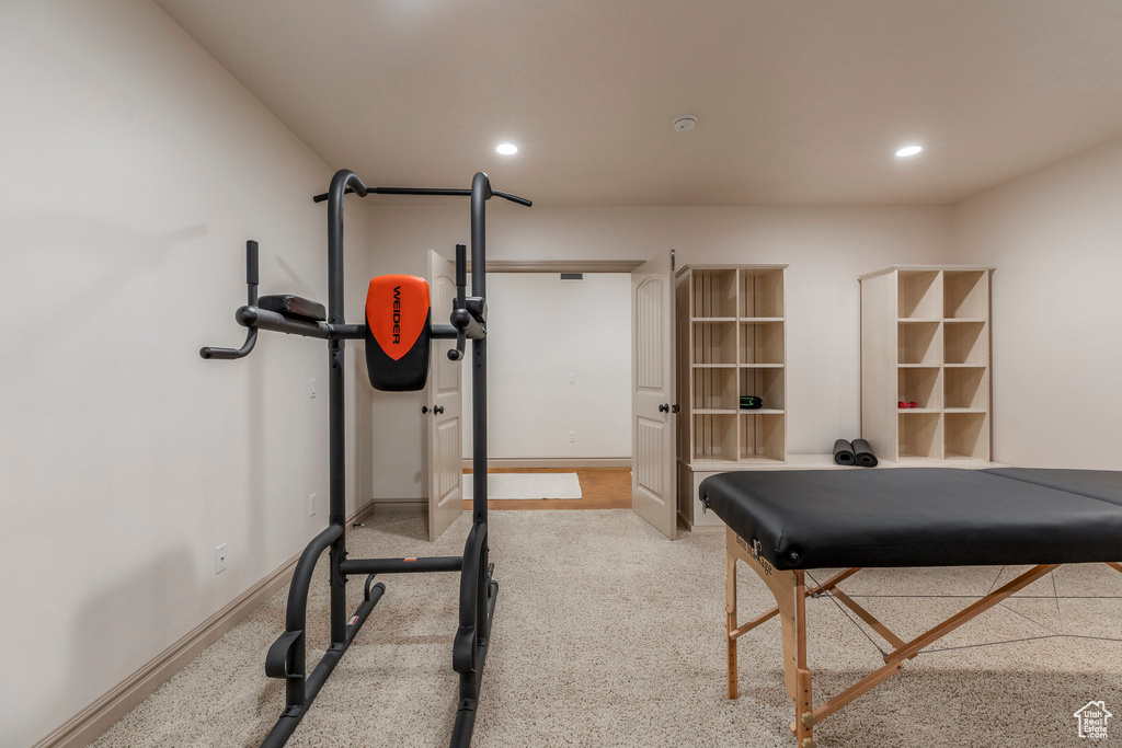 Workout area with carpet and recessed lighting