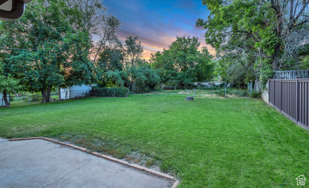 Fenced backyard featuring a patio area