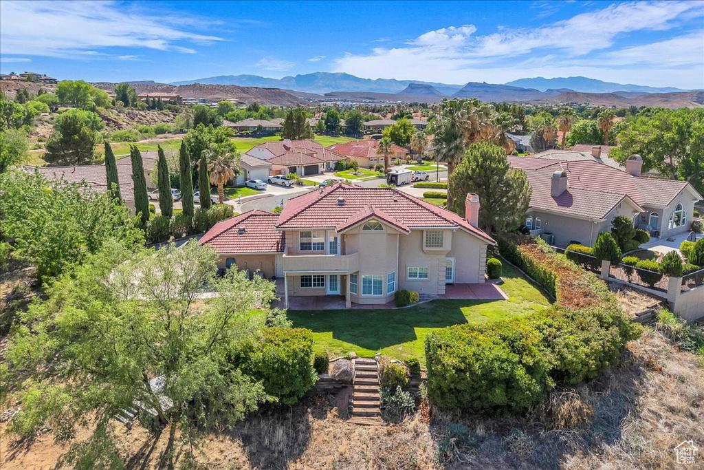 Aerial view of residential area with mountains